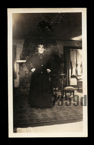 Creepy 1920s Snapshot Woman Wearing Halloween Mask in Darkened Room VTG Photo