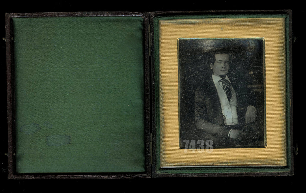 Early Daguerreotype of a Man in Oversized Leather Case 1840s