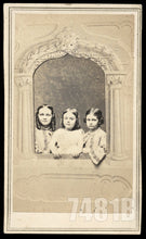 Load image into Gallery viewer, Bogardus CDV of Three Cute Little Girls Posing in Prop Window 1860s
