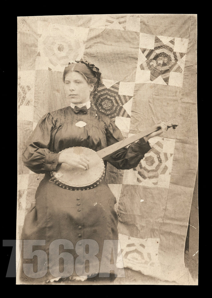 ID'd Girl Playing the Banjo in Front of Homemade Quilt Backdrop RPPC Photo 1910s