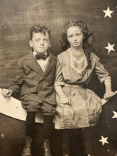 Load image into Gallery viewer, Kids Sitting On Paper Prop Moon 1910s Antique Photo RPPC Vintage
