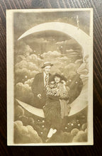 Load image into Gallery viewer, Man &amp; Woman Sitting Paper Prop Moon Dated 1916 Antique Photo RPPC
