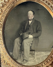Load image into Gallery viewer, Unusual 1/6 Ruby Ambrotype of Seated Man Holding Hat 1850s

