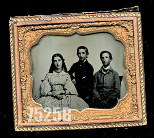 Sixth-plate ambrotype of three children, identified inside of the case. Very good or better antique condition in half of its original case.