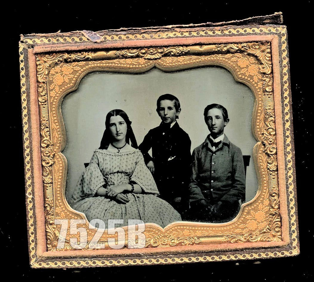 Sixth-plate ambrotype of three children, identified inside of the case. Very good or better antique condition in half of its original case.