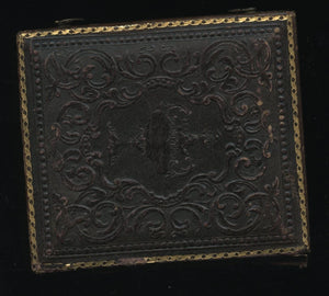 Sixth-plate ambrotype of three children, identified inside of the case. Very good or better antique condition in half of its original case.