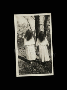 old snapshot photo girls long black hair backs to camera - creepy witch sisters