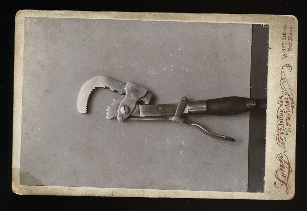 unusual antique photo - cabinet card of a wrench - san diego california