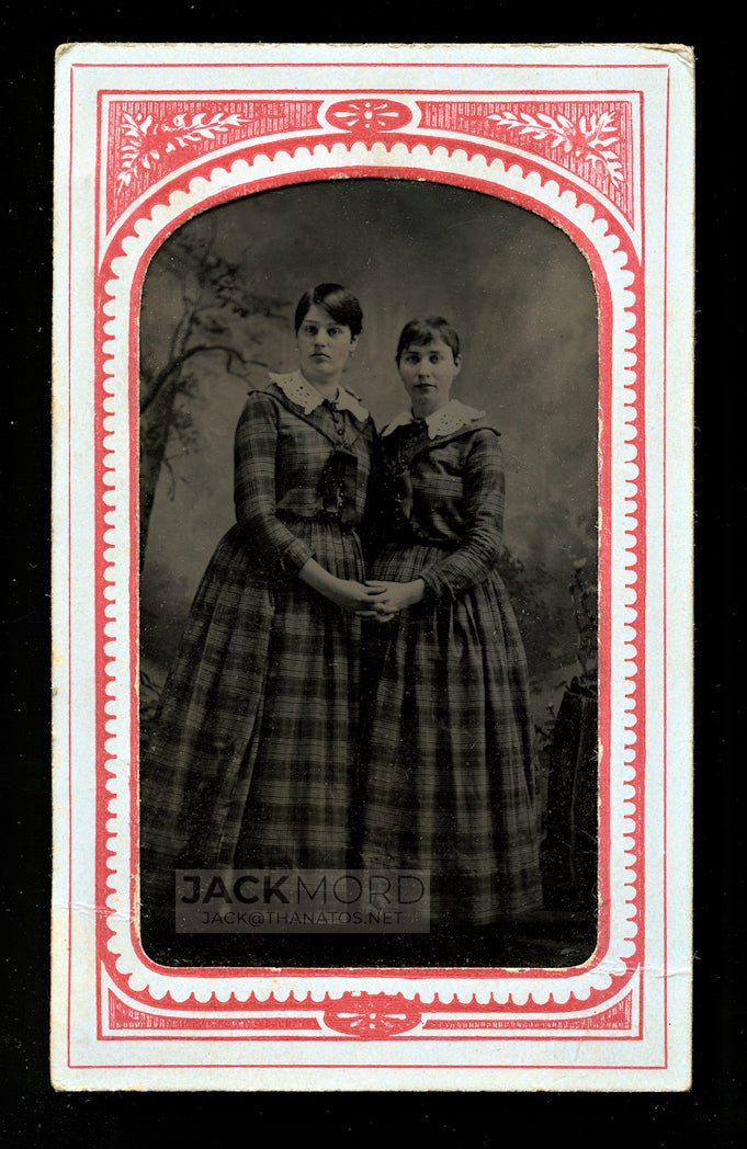 sweet photo short hair girls in matching dresses holding hands antique tintype