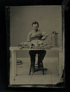 1800s occupational tintype amputee? worker at bench with tools