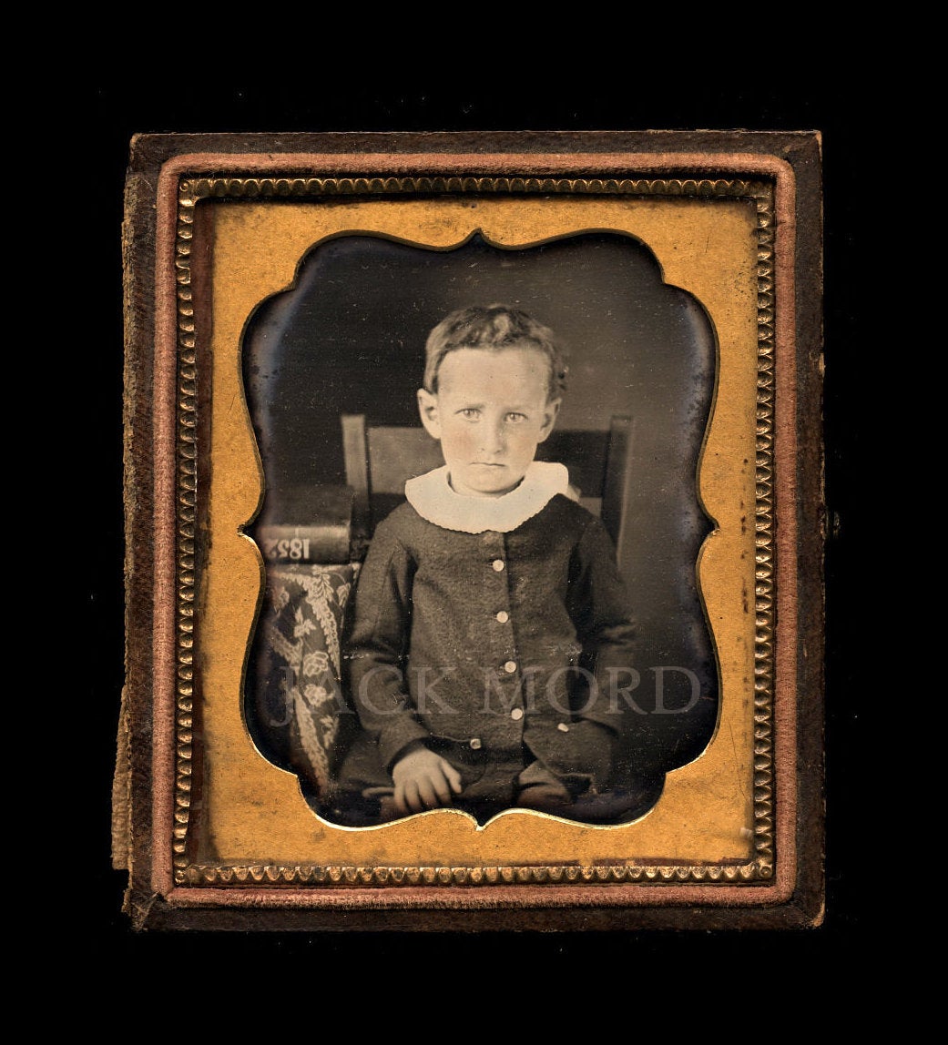 Dated Daguerreotype Sad Little Boy with Sign DATE (1852) Written on Book