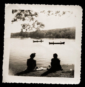 artistic snapshot photo silhouette women backs to camera - nature scene, boating