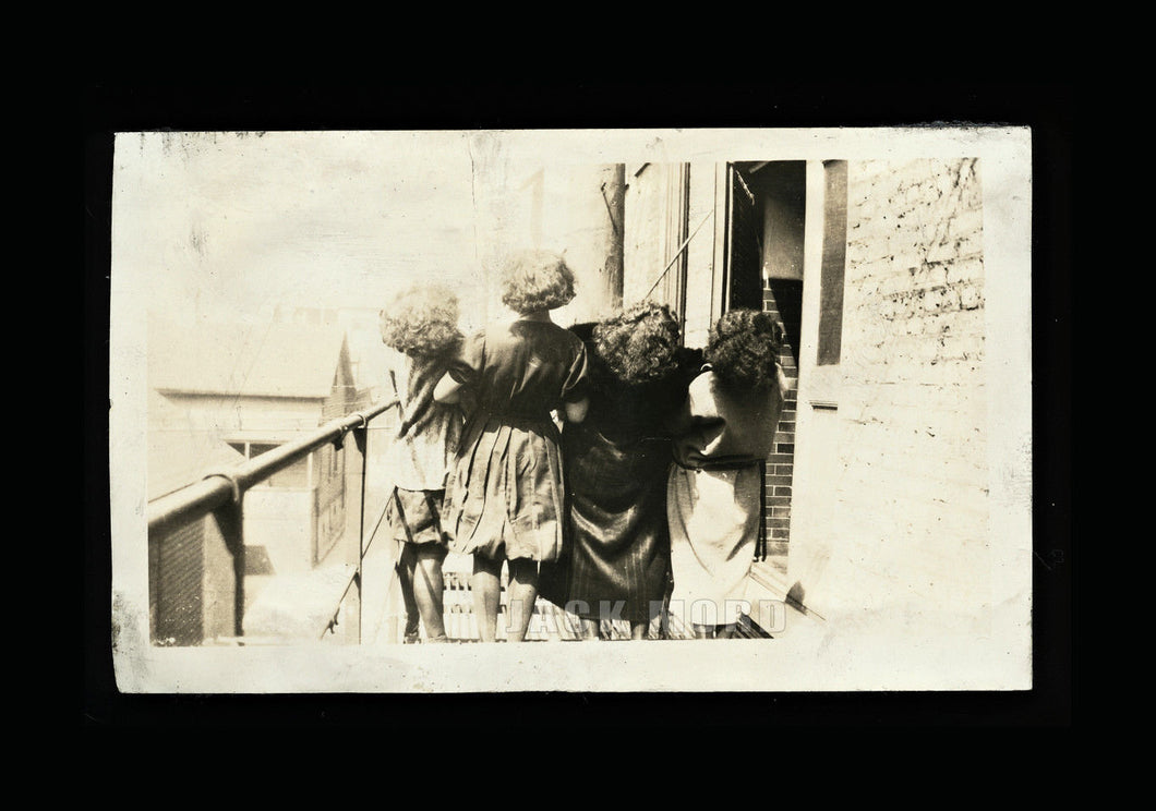 Unusual vintage / antique snapshot photo group of girls facing away from camera