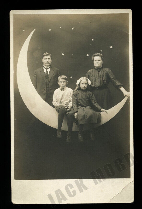 Family Sitting on Paper / Prop Moon - Vintage Photo RPPC