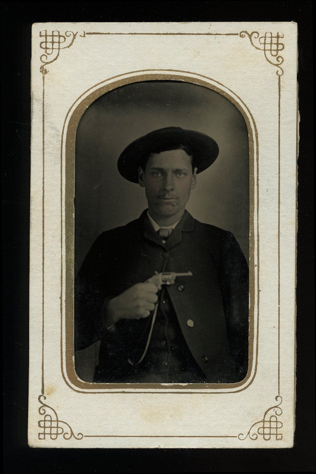 Western Man Holding Gun - Antique 1870s Tintype Photo