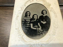Load image into Gallery viewer, 1860s tintype three id&#39;d girls on embossed mount with note + dated april 1867
