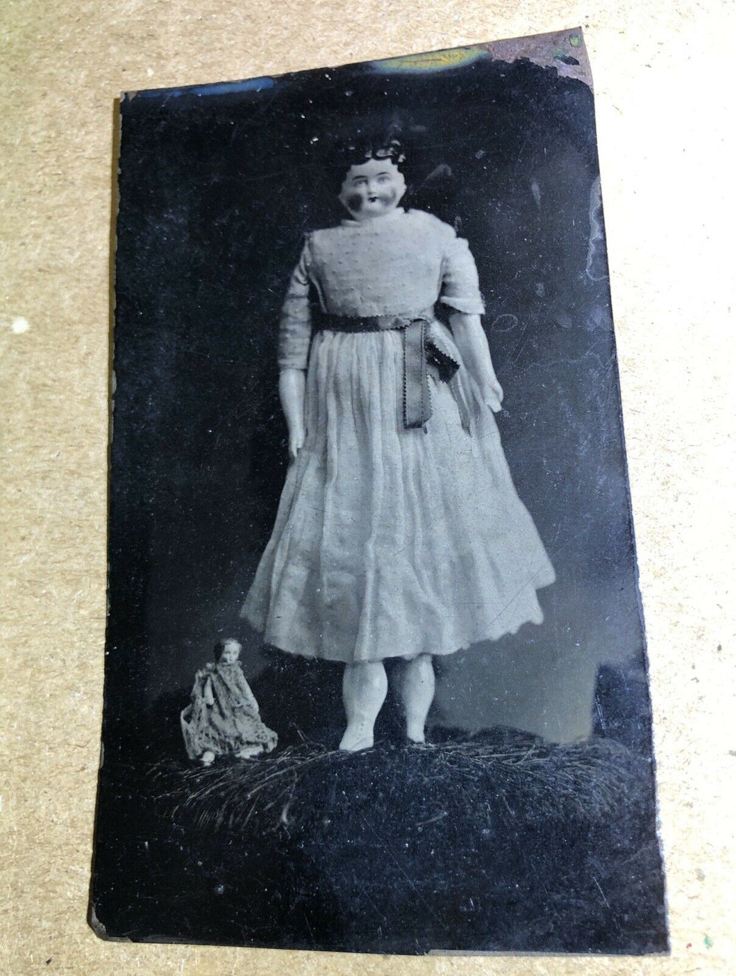 creepy antique 1860s tintype photo big china doll with its own little mini me