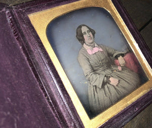 Hand Tinted Color Daguerreotype of Woman Holding Flower, Leather Case, Sealed