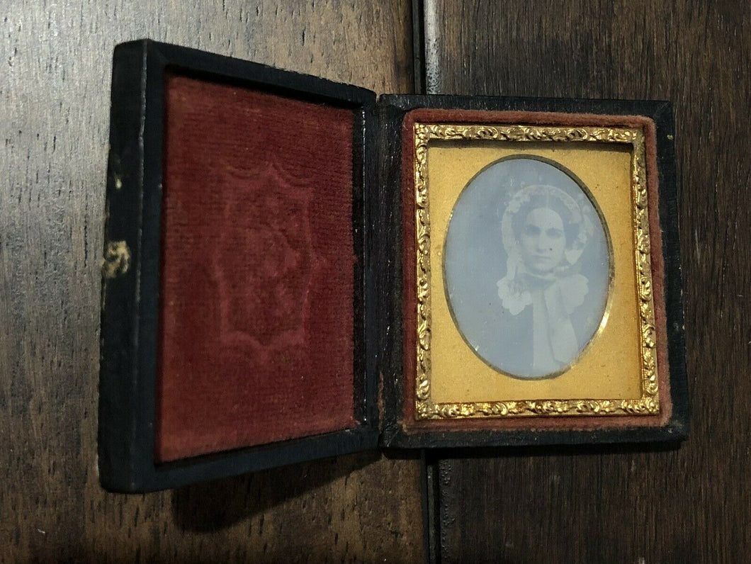 miniature sixteenth plate daguerreotype woman wearing bonnet