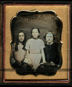 tinted daguerreotype woman & daughters, older with long ringlet curls in hair